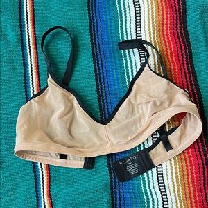 Negative Underwear Tan Bra with Adjustable Straps and Seamless Design